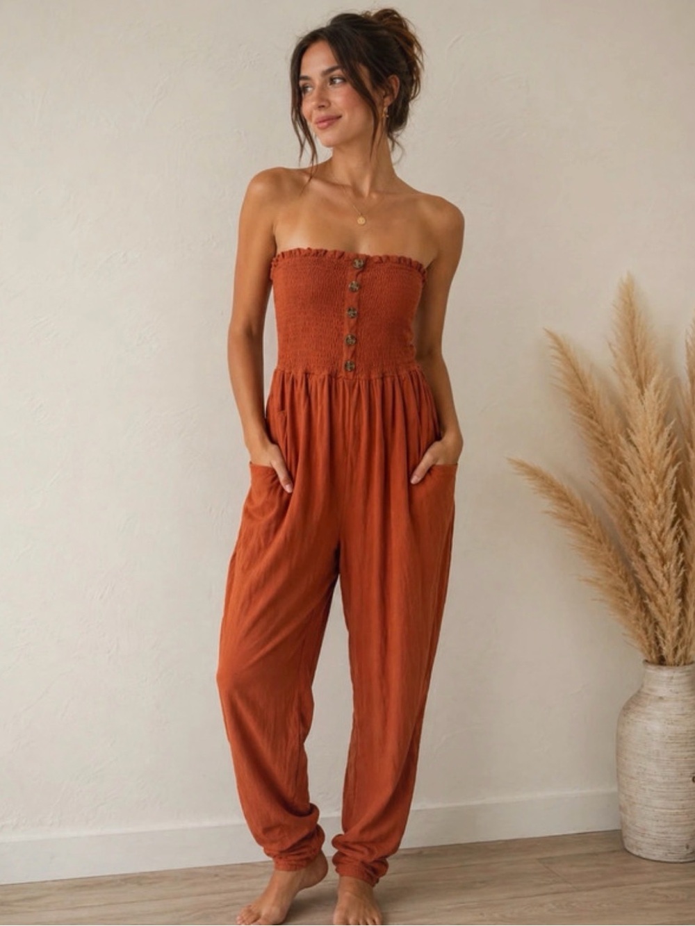 Solemio Strapless Smocked Jumpsuit in Rust